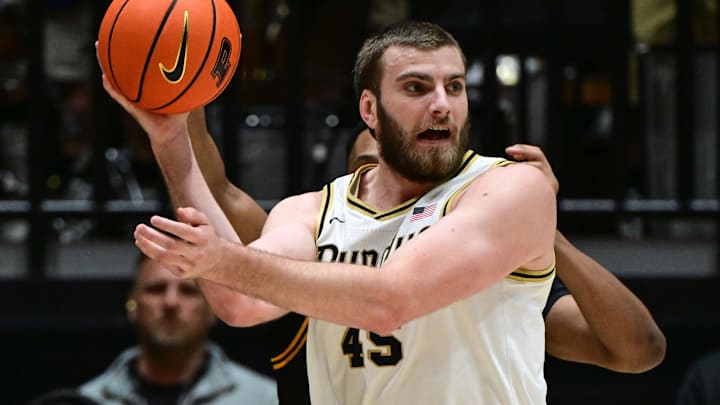 Purdue Boilermakers center Oscar Cluff (45) looks for an open teammate