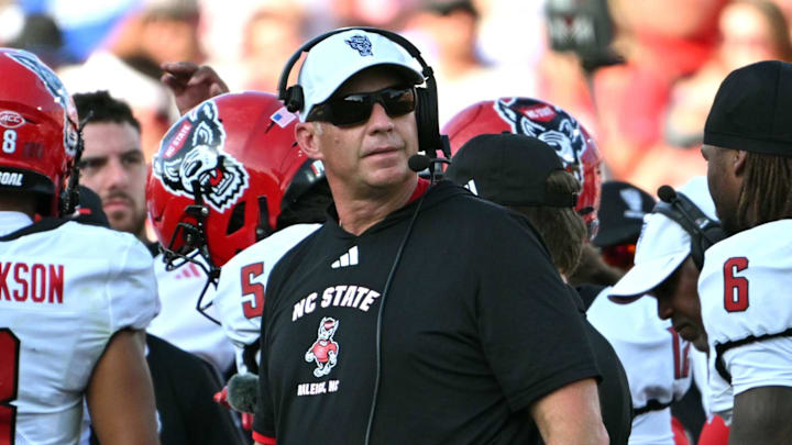 Sep 20, 2025; Durham, North Carolina, USA;  NC State Wolfpack head coach Dave Doeren during the second quarter against the Duke Blue Devils at Wallace Wade Stadium. Mandatory Credit: Zachary Taft-Imagn Images