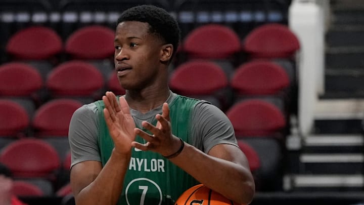 Mar 20, 2025; Raleigh, NC, USA; Baylor Bears guard VJ Edgecombe (7) reacts during practice at Lenovo Center. Mandatory Credit: Bob Donnan-Imagn Images