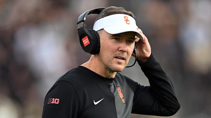 Sep 13, 2025; West Lafayette, Indiana, USA; Southern California Trojans head coach Lincoln Riley stands on the sidelines during the first quarter against the Purdue Boilermakers at Ross-Ade Stadium. Mandatory Credit: Marc Lebryk-Imagn Images Sep 13, 2025; West Lafayette, Indiana, USA; Southern California Trojans head coach Lincoln Riley stands on the sidelines during the first quarter against the Purdue Boilermakers at Ross-Ade Stadium. Mandatory Credit: Marc Lebryk-Imagn Images
