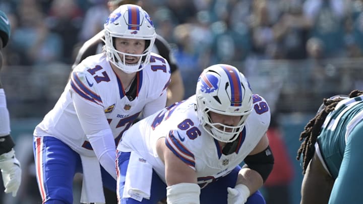 Jan 11, 2026; Jacksonville, FL, USA; Buffalo Bills center Connor McGovern (66) prepares to snap the ball to quarterback Josh Allen (17) during the first half against the Jacksonville Jaguars in an AFC Wild Card Round game at EverBank Stadium. Mandatory Credit: Melina Myers-Imagn Images