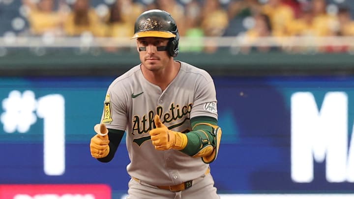 Athletics outfielder Brent Rooker (25) gestures to the Athletics dugout after doubling against the Washington Nationals during the first inning at Nationals Park.