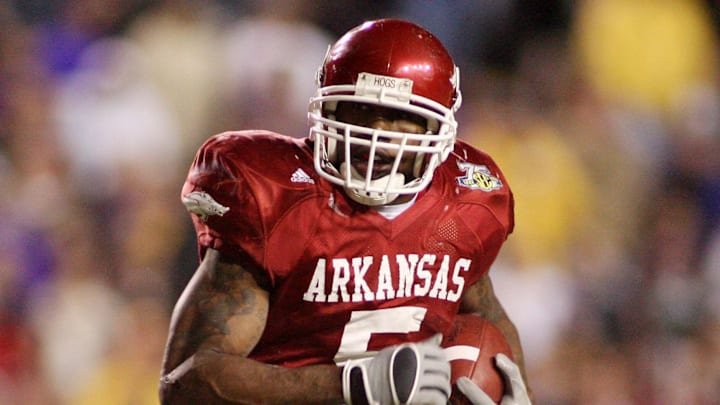 Arkansas Razorbacks tailback Darren McFadden (5) carries against the LSU Tigers in overtime at Tiger Stadium. The Arkansas Razorbacks defeated the Tigers 50-48 in triple overtime. 