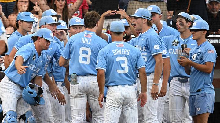 Jun 12, 2026; Omaha, NE, USA; Teammates celebrates as North Carolina Tar Heels center fielder Owen Hull (8) returns to the dugout after hitting a home run against the Mississippi Rebels during the sixth inning at Charles Schwab Field. Mandatory Credit: Steven Branscombe-Imagn Images Jun 12, 2026; Omaha, NE, USA; Teammates celebrates as North Carolina Tar Heels center fielder Owen Hull (8) returns to the dugout after hitting a home run against the Mississippi Rebels during the sixth inning at Charles Schwab Field. Mandatory Credit: Steven Branscombe-Imagn Images