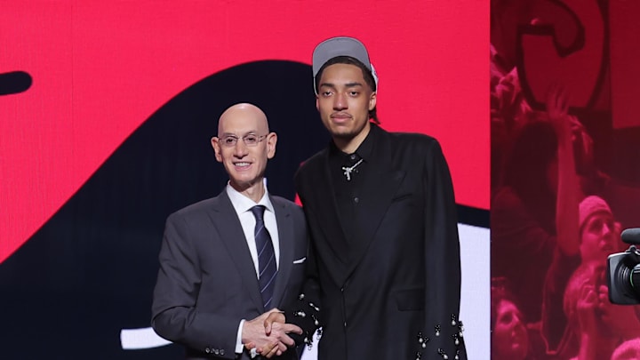 Jun 25, 2025; Brooklyn, NY, USA; Noa Essengue stands with NBA commissioner Adam Silver after being selected as the 12th pick by the Chicago Bulls in the first round of the 2025 NBA Draft at Barclays Center. Mandatory Credit: Brad Penner-Imagn Images Jun 25, 2025; Brooklyn, NY, USA; Noa Essengue stands with NBA commissioner Adam Silver after being selected as the 12th pick by the Chicago Bulls in the first round of the 2025 NBA Draft at Barclays Center. Mandatory Credit: Brad Penner-Imagn Images