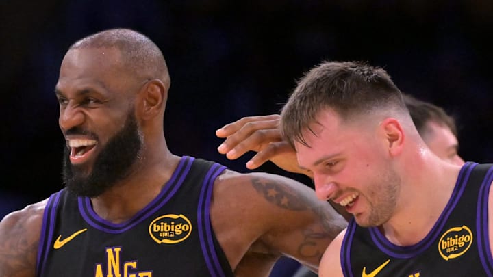 Los Angeles Lakers forward LeBron James and Los Angeles Lakers guard Luka Doncic.