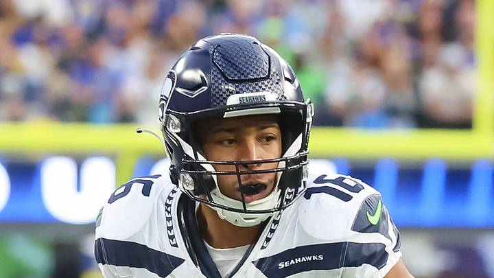 Seattle Seahawks Wide Receiver Tyler Lockett runs down the field baseline.