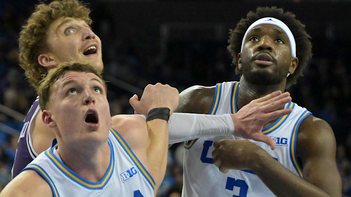 Jan 24, 2026; Los Angeles, California, USA;  UCLA Bruins forward Tyler Bilodeau (34) and guard Eric Dailey Jr. (3) box out Northwestern Wildcats forward Nick Martinelli (2) in the second half at Pauley Pavilion presented by Wescom Financial. Mandatory Credit: Jayne Kamin-Oncea-Imagn Images
