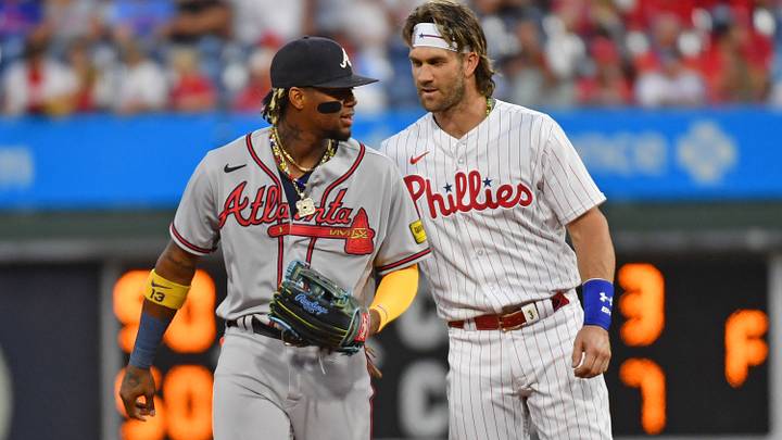 Sep 13, 2023; Philadelphia, Pennsylvania, USA; Atlanta Braves right fielder Ronald Acuna Jr. (13) and Philadelphia Phillies designated hitter Bryce Harper (3) during the first inning at Citizens Bank Park. Mandatory Credit: Eric Hartline-USA TODAY Sports Sep 13, 2023; Philadelphia, Pennsylvania, USA; Atlanta Braves right fielder Ronald Acuna Jr. (13) and Philadelphia Phillies designated hitter Bryce Harper (3) during the first inning at Citizens Bank Park. Mandatory Credit: Eric Hartline-USA TODAY Sports