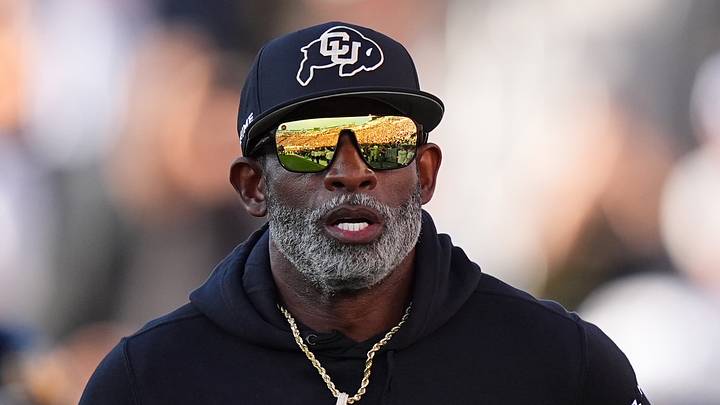 Colorado Buffaloes head coach Deion Sanders runs onto the field before the game against the North Dakota State Bison at Folsom Field. Colorado Buffaloes head coach Deion Sanders runs onto the field before the game against the North Dakota State Bison at Folsom Field.