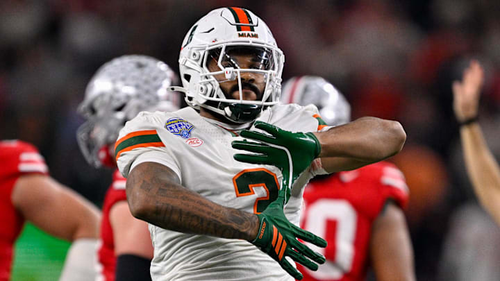 Dec 31, 2025; Arlington, TX, USA; Miami Hurricanes defensive lineman Akheem Mesidor (3) celebrates after he sacks Ohio State Buckeyes quarterback Julian Sayin (not pictured) during the 2025 Cotton Bowl and quarterfinal game of the College Football Playoff at AT&T Stadium. Mandatory Credit: Jerome Miron-Imagn Images