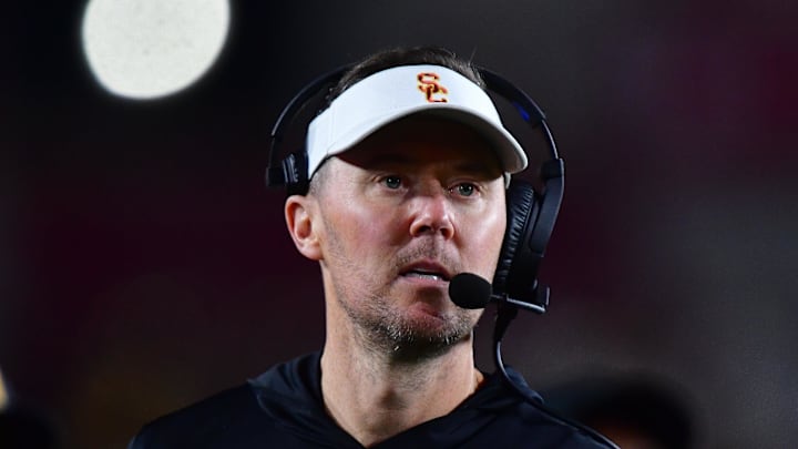 Nov 7, 2025; Los Angeles, California, USA; Southern California Trojans head coach Lincoln Riley watches game action against the Northwestern Wildcats during the second half at the Los Angeles Memorial Coliseum. Mandatory Credit: Gary A. Vasquez-Imagn Images Nov 7, 2025; Los Angeles, California, USA; Southern California Trojans head coach Lincoln Riley watches game action against the Northwestern Wildcats during the second half at the Los Angeles Memorial Coliseum. Mandatory Credit: Gary A. Vasquez-Imagn Images