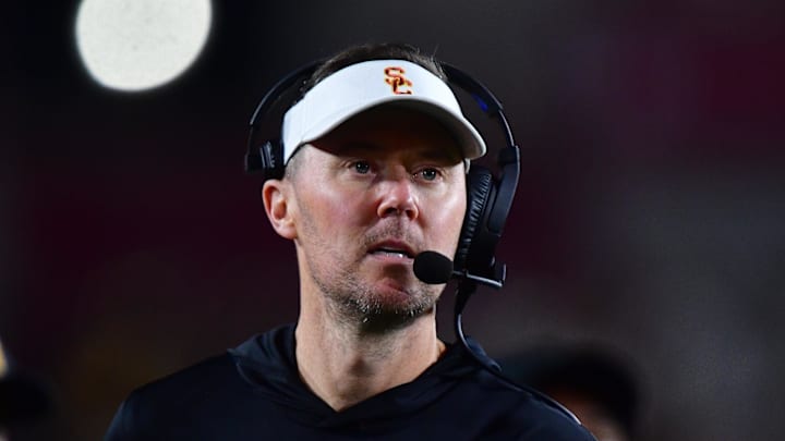Nov 7, 2025; Los Angeles, California, USA; Southern California Trojans head coach Lincoln Riley watches game action against the Northwestern Wildcats during the second half at the Los Angeles Memorial Coliseum. Mandatory Credit: Gary A. Vasquez-Imagn Images
