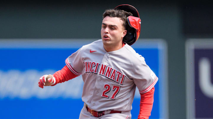 Cincinnati Reds second baseman Sal Stewart (27) loses his helmet