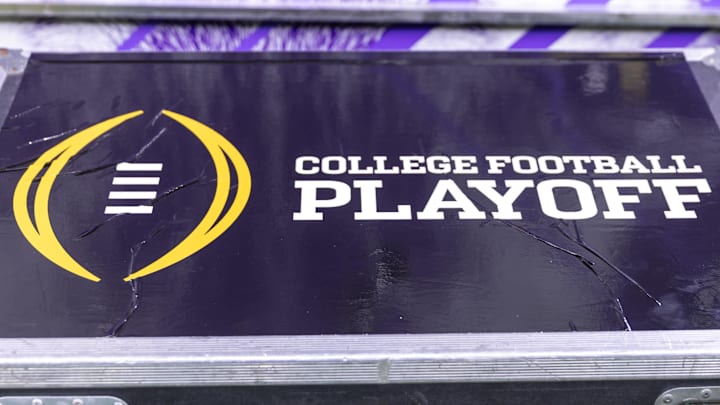 Jan 1, 2024; New Orleans, LA, USA; A general view of the College Football Playoff logo on a case on the Washington Huskies sideline before the 2024 Sugar Bowl college football playoff semifinal game between the Texas Longhorns and the Washington Huskies at Caesars Superdome. Mandatory Credit: Stephen Lew-Imagn Images