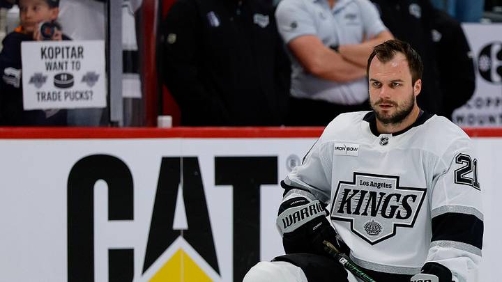 Apr 21, 2026; Denver, Colorado, USA; Los Angeles Kings center Scott Laughton (21) stretches before game two against the Colorado Avalanche of the first round of the 2026 Stanley Cup Playoffs at Ball Arena. Mandatory Credit: 
