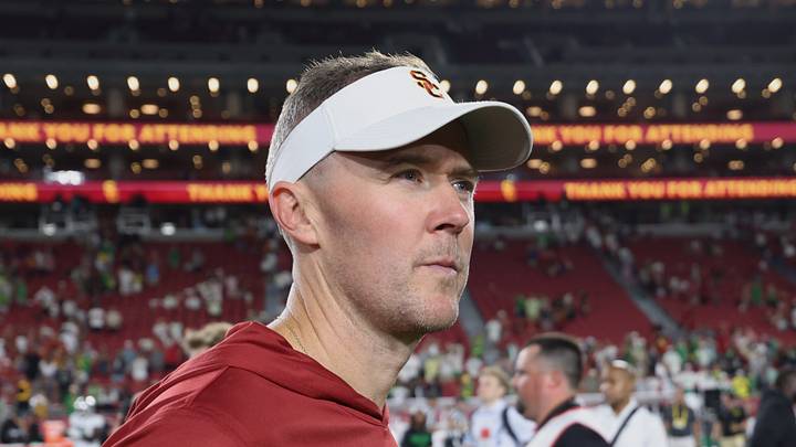 Sep 26, 2026; Los Angeles, California, USA; USC Trojans head coach Lincoln Riley walks off the field after the game against the Oregon Ducks at United Airlines Field at Los Angeles Memorial Coliseum. Mandatory Credit: Kiyoshi Mio-Imagn Images Sep 26, 2026; Los Angeles, California, USA; USC Trojans head coach Lincoln Riley walks off the field after the game against the Oregon Ducks at United Airlines Field at Los Angeles Memorial Coliseum. Mandatory Credit: Kiyoshi Mio-Imagn Images