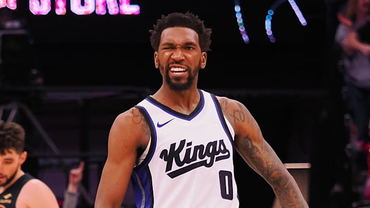 Mar 19, 2025; Sacramento, California, USA; Sacramento Kings guard Malik Monk (0) celebrates after a basket against the Cleveland Cavaliers during the fourth quarter at Golden 1 Center. Mandatory Credit: Kelley L Cox-Imagn Images Mar 19, 2025; Sacramento, California, USA; Sacramento Kings guard Malik Monk (0) celebrates after a basket against the Cleveland Cavaliers during the fourth quarter at Golden 1 Center. Mandatory Credit: Kelley L Cox-Imagn Images