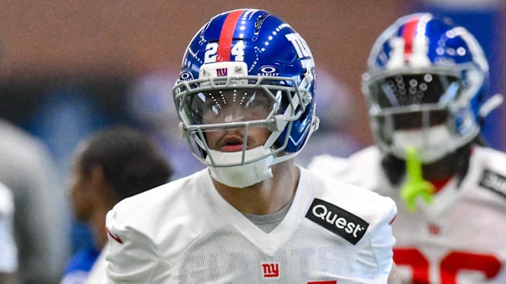 Jun 17, 2025; East Rutherford, NJ, USA; New York Giants safety Dane Belton (24) warms up during minicamp at Quest Diagnostics Training Center.  