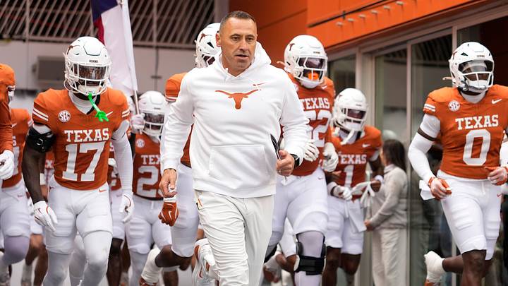 Texas Longhorns head coach Steve Sarkisian leads his team on to the field before a game against the Vanderbilt Commodores at Darrell K Royal-Texas Memorial Stadium. Texas Longhorns head coach Steve Sarkisian leads his team on to the field before a game against the Vanderbilt Commodores at Darrell K Royal-Texas Memorial Stadium.