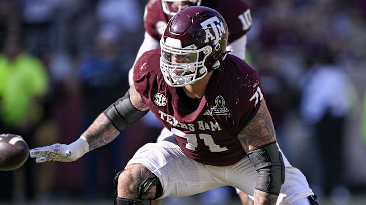 Texas A&M Aggies offensive lineman Chase Bisontis (71) blocks the rush during the game between the Aggies and the Hurricanes at Kyle Field. Mandatory Credit: Jerome Miron-Imagn Images