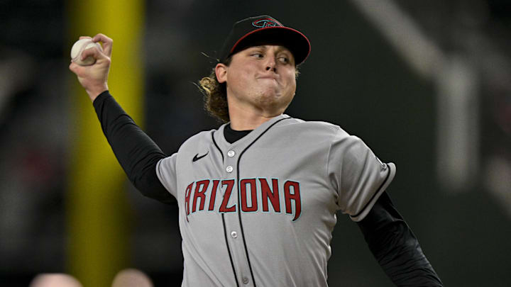 Aug 11, 2025; Arlington, Texas, USA; Arizona Diamondbacks relief pitcher Andrew Hoffmann (56) pitches during the game between the Texas Rangers and the Arizona Diamondbacks at Globe Life Field. Mandatory Credit: Jerome Miron-Imagn Images