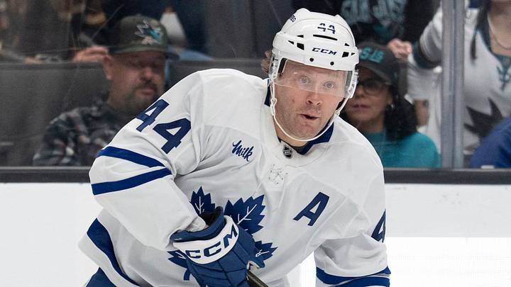 Apr 2, 2026; San Jose, California, USA;  Toronto Maple Leafs defenseman Morgan Rielly (44) looks to pass the puck during the first period against the San Jose Sharks at SAP Center at San Jose. Mandatory Credit: Stan Szeto-Imagn Images