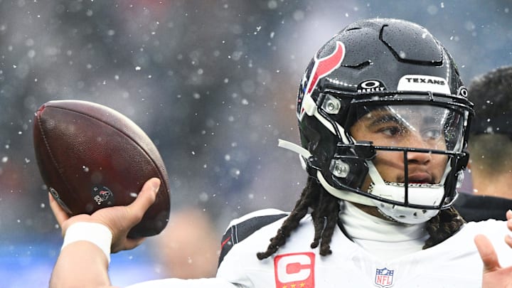 Houston Texans quarterback C.J. Stroud warms up before an AFC Divisional Round game against the New England Patriots. Houston Texans quarterback C.J. Stroud warms up before an AFC Divisional Round game against the New England Patriots.