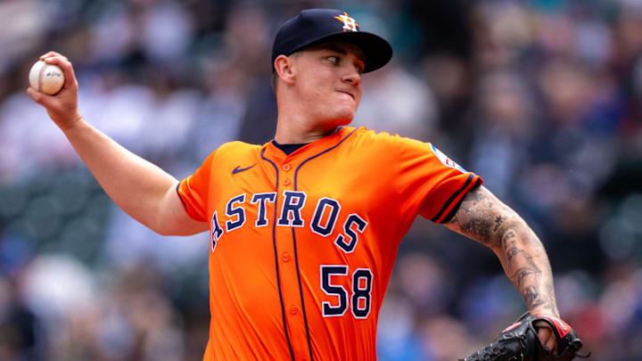 Apr 9, 2025; Seattle, Washington, USA;  Houston Astros starter Hunter Brown (58) delivers a pitch during the first inning against the Seattle Mariners at T-Mobile Park.