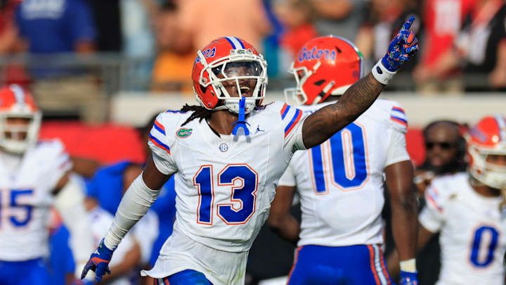 Florida Gators defensive back Aaron Gates (13) celebrates his interception during the second quarter of an NCAA college football matchup Saturday, Nov. 2, 2024 at EverBank Stadium in Jacksonville, Fla. The Georgia Bulldogs defeated the Florida Gators 34-20. [Corey Perrine/Florida Times-Union]