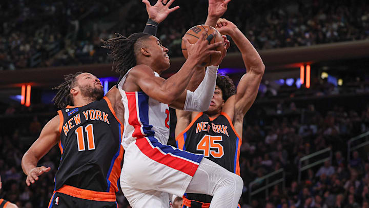 Nov 11, 2022; New York, New York, USA; Detroit Pistons guard Jaden Ivey (23) drives to the basket as New York Knicks guard Jalen Brunson (11) and center Jericho Sims (45) defend during the first half at Madison Square Garden. Mandatory Credit: Vincent Carchietta-Imagn Images Nov 11, 2022; New York, New York, USA; Detroit Pistons guard Jaden Ivey (23) drives to the basket as New York Knicks guard Jalen Brunson (11) and center Jericho Sims (45) defend during the first half at Madison Square Garden. Mandatory Credit: Vincent Carchietta-Imagn Images