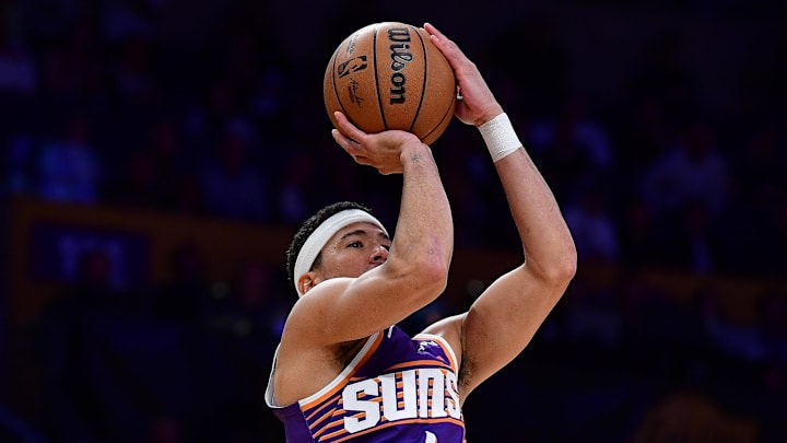 Dec 1, 2025; Los Angeles, California, USA; Phoenix Suns guard Devin Booker (1) shoots against the Los Angeles Lakers during the first half at Crypto.com Arena. Mandatory Credit: Gary A. Vasquez-Imagn Images Dec 1, 2025; Los Angeles, California, USA; Phoenix Suns guard Devin Booker (1) shoots against the Los Angeles Lakers during the first half at Crypto.com Arena. Mandatory Credit: Gary A. Vasquez-Imagn Images