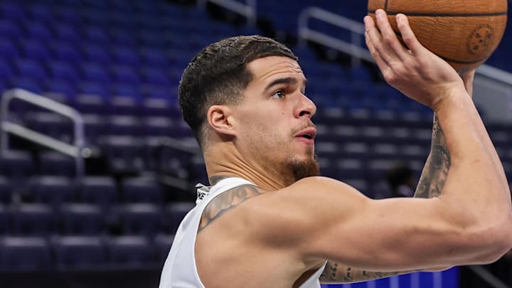 Nov 14, 2025; Orlando, Florida, USA; Brooklyn Nets forward Michael Porter Jr. (17) warms up before the game against the Orlando Magic at Kia Center. Mandatory Credit: Mike Watters-Imagn Images