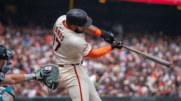 Apr 6, 2025; San Francisco, California, USA; San Francisco Giants designated hitter Heliot Ramos (17) hits a RBI single during the fourth inning against the Seattle Mariners at Oracle Park. 