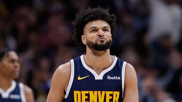 Dec 22, 2025; Denver, Colorado, USA; Denver Nuggets guard Jamal Murray (27) reacts after a play in the first quarter against the Utah Jazz at Ball Arena.