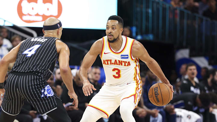 Apr 1, 2026; Orlando, Florida, USA; Atlanta Hawks guard CJ McCollum (3) is guarded by Orlando Magic guard Jalen Suggs (4) in the second quarter at Kia Center. Mandatory Credit: Nathan Ray Seebeck-Imagn Images