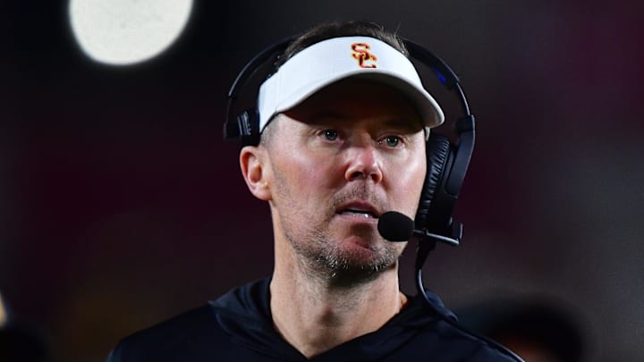 Nov 7, 2025; Los Angeles, California, USA; Southern California Trojans head coach Lincoln Riley watches game action against the Northwestern Wildcats during the second half at the Los Angeles Memorial Coliseum. 