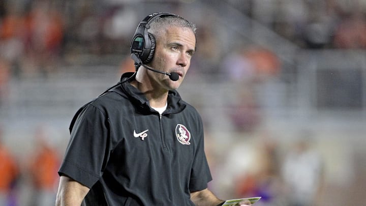 Oct 5, 2024; Tallahassee, Florida, USA; Florida State Seminoles head coach Mike Norvell looks on during the second half against the Clemson Tigers at Doak S. Campbell Stadium. Mandatory Credit: Melina Myers-Imagn Images Oct 5, 2024; Tallahassee, Florida, USA; Florida State Seminoles head coach Mike Norvell looks on during the second half against the Clemson Tigers at Doak S. Campbell Stadium. Mandatory Credit: Melina Myers-Imagn Images