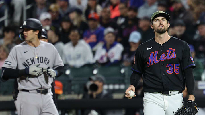 May 15, 2026; New York City, New York, USA; New York Mets catcher Luis Torrens (13) looks down at the leg of pitcher Clay Holmes (35) during the fifth inning against the New York Yankees at Citi Field. Mandatory Credit: Vincent Carchietta-Imagn Images