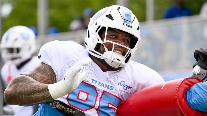 Aug 4, 2026; Nashville, TN, USA; Tennessee Titans defensive lineman Jordan Elliott (95) goes through drills during training camp at Vanderbilt Health Football Center. Mandatory Credit: Steve Roberts-Imagn Images Aug 4, 2026; Nashville, TN, USA; Tennessee Titans defensive lineman Jordan Elliott (95) goes through drills during training camp at Vanderbilt Health Football Center. Mandatory Credit: Steve Roberts-Imagn Images