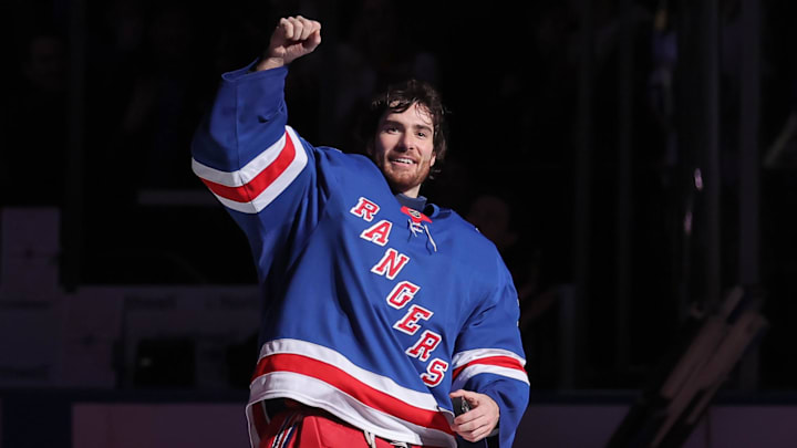 Mar 27, 2026; New York, New York, USA; New York Rangers goaltender Dylan Garand (33) reacts after being announced as the first star of the game against the Chicago Blackhawks at Madison Square Garden. The win was the first in his NHL career. Mandatory Credit: Brad Penner-Imagn Images
