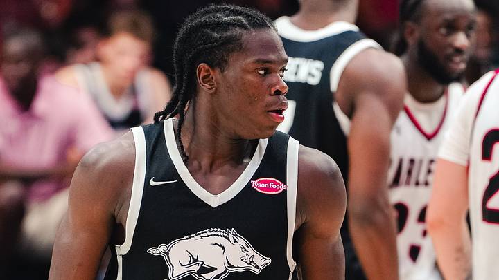 Arkansas Razorbacks guard Jordan Smith heads to sideline during a timeout against Carleton University. Arkansas Razorbacks guard Jordan Smith heads to sideline during a timeout against Carleton University.