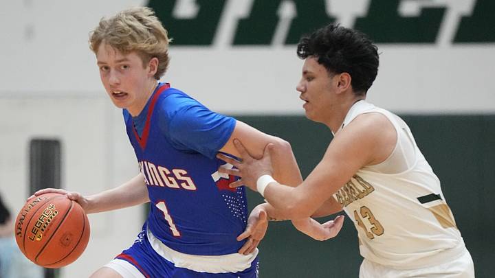 Wisconsin Lutheran's Kager Knueppel (1) works to get past Greenfield's Jayden Valdez (13) during the game on February 26, 2025. Wisconsin Lutheran won the game, 93-59. Wisconsin Lutheran's Kager Knueppel (1) works to get past Greenfield's Jayden Valdez (13) during the game on February 26, 2025. Wisconsin Lutheran won the game, 93-59.