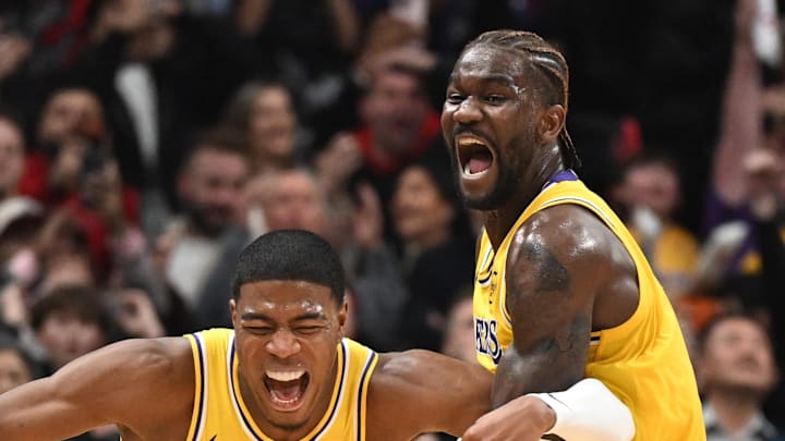 Dec 4, 2025; Toronto, Ontario, CAN; Los Angeles Lakers forward Rui Hachimura (28) celebrates with center Deandre Ayton (5) after scoring the game winning buzzer beating basket against the Toronto Raptos half at Scotiabank Arena. Mandatory Credit: Dan Hamilton-Imagn Images