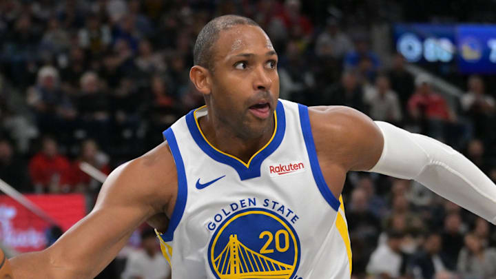 Apr 15, 2026; Inglewood, California, USA; Golden State Warriors center Al Horford (20) reaches in front of Los Angeles Clippers guard Jordan Miller (22) for a loose ball in the second half during the play-in rounds of the 2026 NBA Playoffs at Intuit Dome. Mandatory Credit: Jayne Kamin-Oncea-Imagn Images