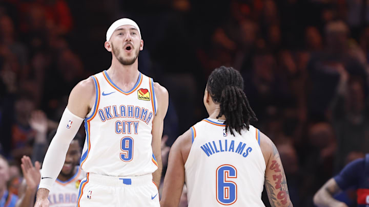 Dec 23, 2024; Oklahoma City, Oklahoma, USA; Oklahoma City Thunder guard Alex Caruso (9) celebrates after his team scores against the Washington Wizards during the second quarter at Paycom Center. Mandatory Credit: Alonzo Adams-Imagn Images