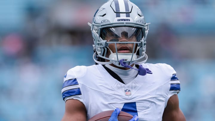 Dallas Cowboys wide receiver Jalen Tolbert warms up before the game against the Carolina Panthers at Bank of America Stadium.