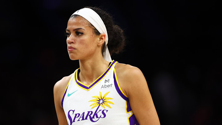 Sep 9, 2025; Phoenix, Arizona, USA; Los Angeles Sparks guard Rae Burrell (12) against the Phoenix Mercury during a WNBA game at PHX Arena. Mandatory Credit: Mark J. Rebilas-Imagn Images