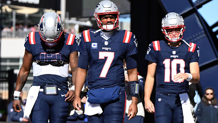 Oct 27, 2024; Foxborough, Massachusetts, USA; New England Patriots quarterback Joe Milton III (19), quarterback Jacoby Brissett (7), and quarterback Drake Maye (10) walk onto the field before a game against the New York Jets at Gillette Stadium.