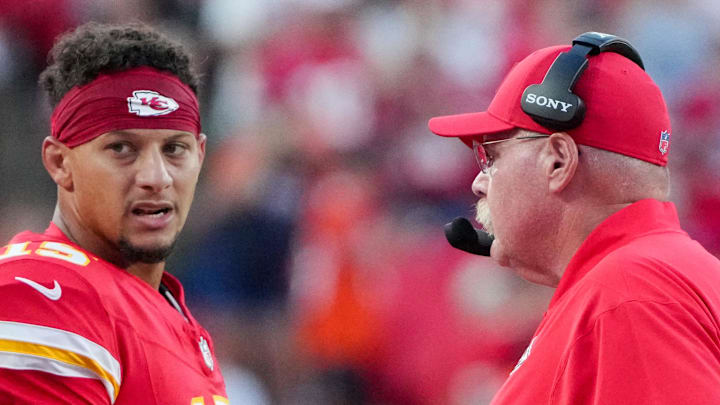 Aug 22, 2025; Kansas City, Missouri, USA; Kansas City Chiefs quarterback Patrick Mahomes (15) talks with head coach Andy Reid after a play against the Chicago Bears during the first half of the game at GEHA Field at Arrowhead Stadium. Mandatory Credit: Denny Medley-Imagn Images